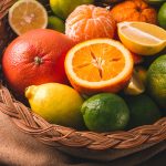 Assortment, citrus fruits, in a basket, close-up, top view, no people,