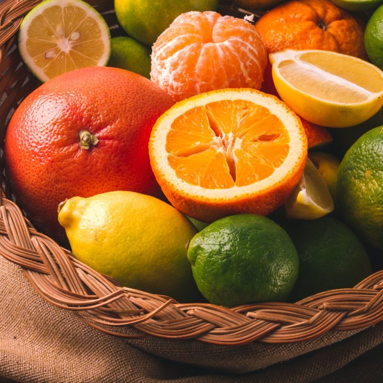 Assortment, citrus fruits, in a basket, close-up, top view, no people,